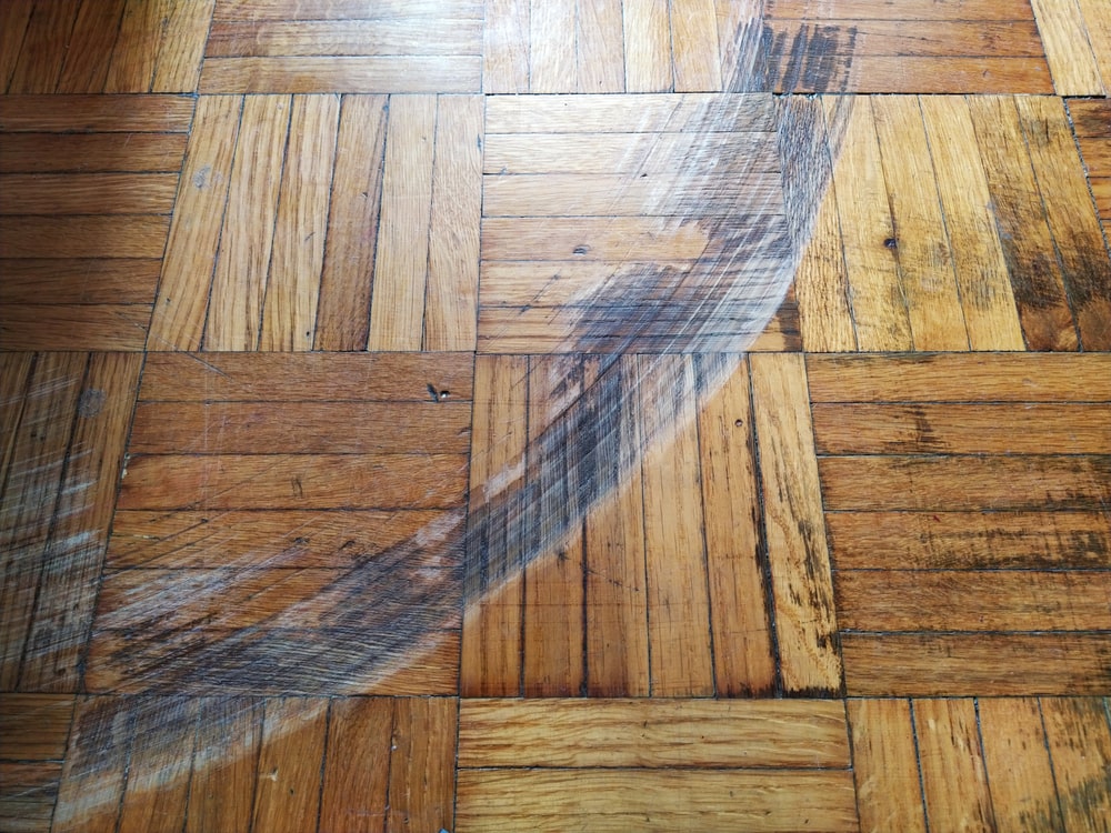 Scratches and dents on a hardwood flooring