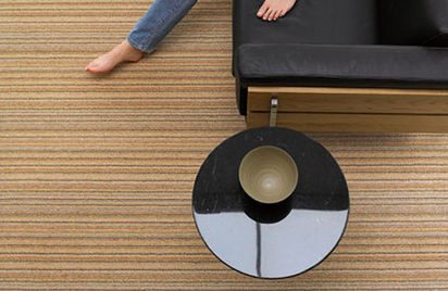 carpet-sofa foot-on-the-carpet
