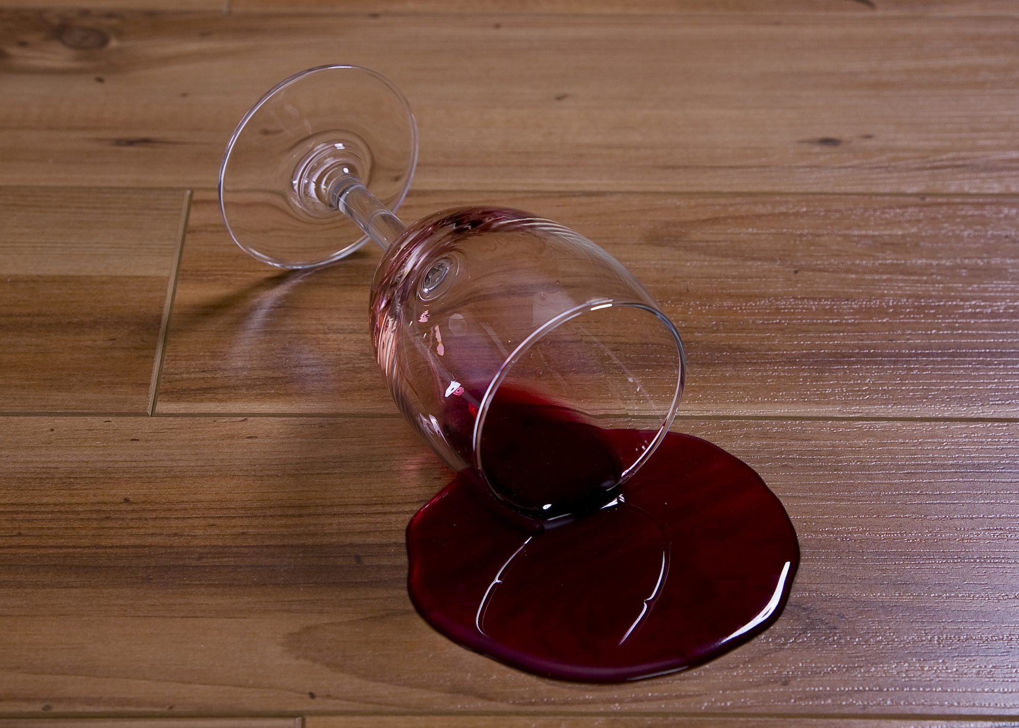 wine-spilled-on-the-woodenn-floor|caffee-stains-on-the-woodenn-floor